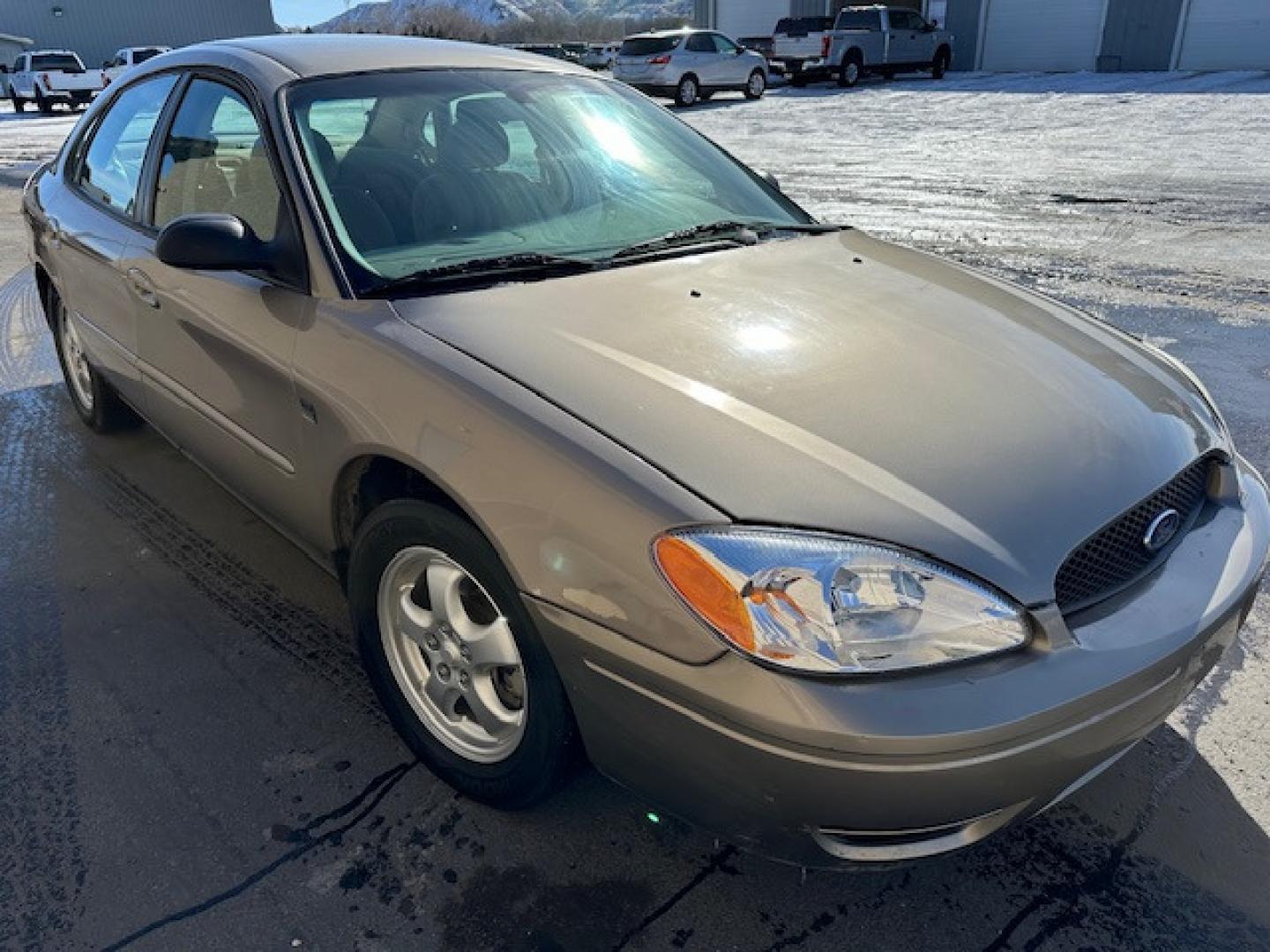 2004 Gold /Beige Ford Taurus (1FAFP55S74G) , Automatic transmission, located at 3200 1st Avenue North, Billings, MT, 59101, (406) 245-9055, 45.779270, -108.510742 - Low Mileage Local Trade-In. Well Maintained, Power Seat, Power Windows, Power Door Locks, Tilt Steering, Duratec Engine and Much More! CarFax Dealer. Auto Brokers of Montana/AA&A Auto Rental/Fox Car Rental Billings - Photo#3